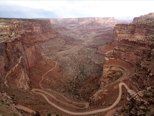 road leading down into red rock canyon